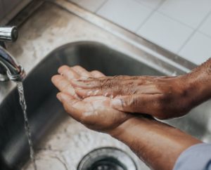 Washing hands in the sink