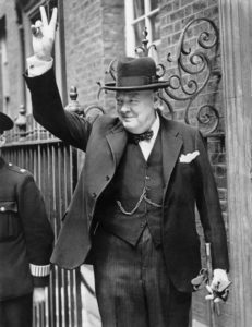 Winston Churchhill displaying a "V" with hands
