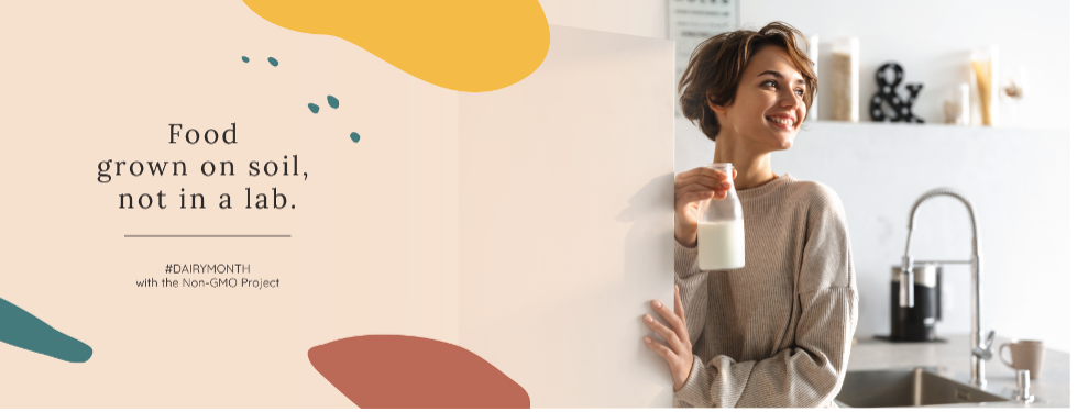 Happy woman takes bottle of milk out of fridge, test on left reads "Food grown on soil, not in a lab. #DAIRYMONTH with the Non-GMO Project"