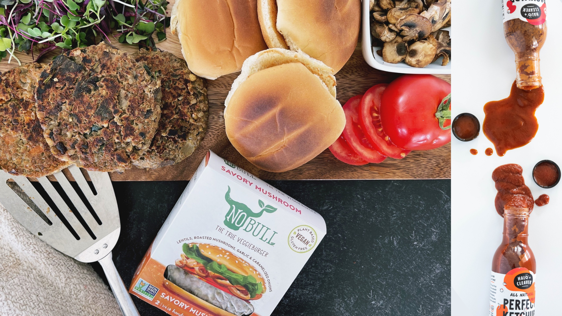 A platter of veggie burger fixings with sprouts, grilled mushrooms and tomatoes, with a product package for NoBull burgers and two bottles of Halo + Cleaver sauces.