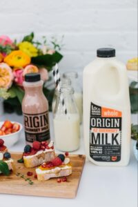 Origin whole milk carton on counter top