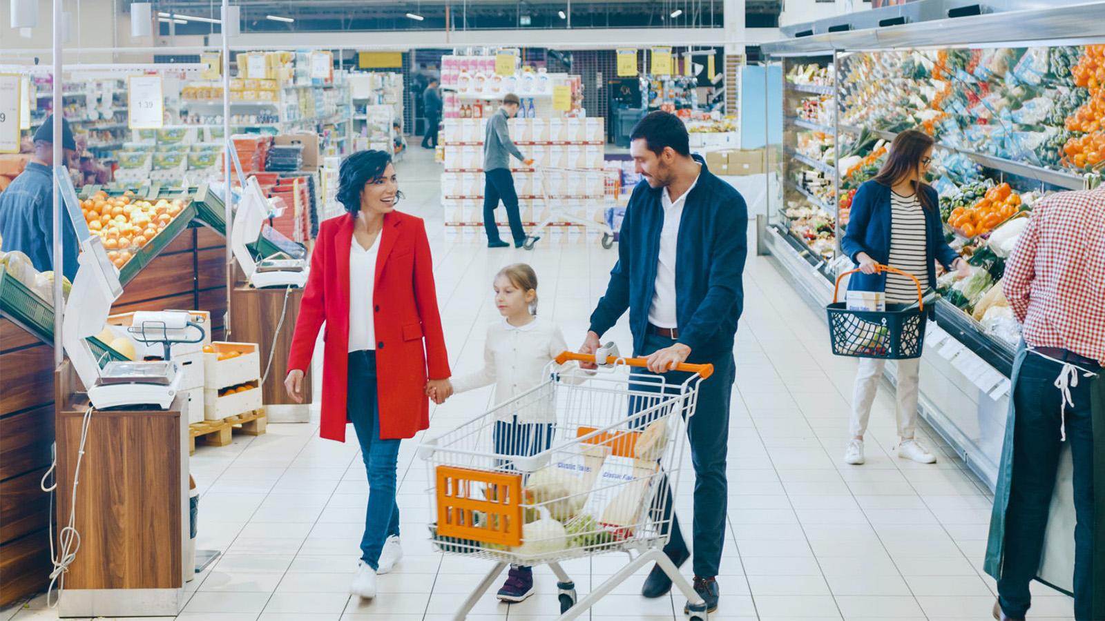 At the Supermarket: Happy Family of Three, Holding Hands, Walks